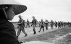 Marines marching in Danang in a scene from "The Vietnam War." Director Ken Burns said,"Vietnam was a tale of morality with an identity that's woven in