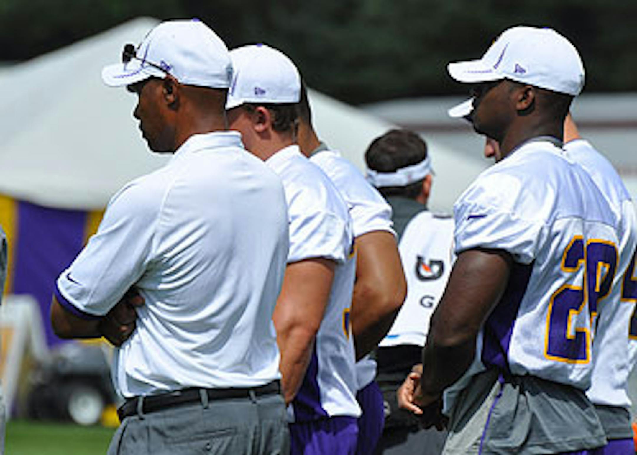 Peterson stood on the side and watched during the Vikings' first walk-thru of training camp.
