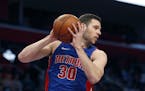 Detroit Pistons forward Jon Leuer pulls down a rebound during the second half of an NBA basketball game against the Oklahoma City Thunder, Monday, Dec