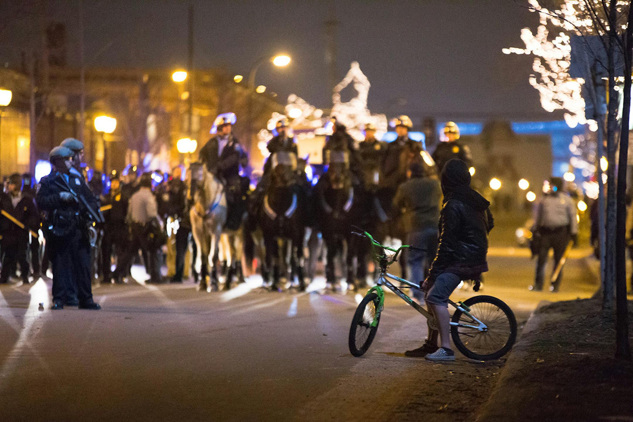 Crowds got rowdy and police massed in the Dinkytown area after the Gophers lost to Union in the NCAA hockey championship April 12, 2014.