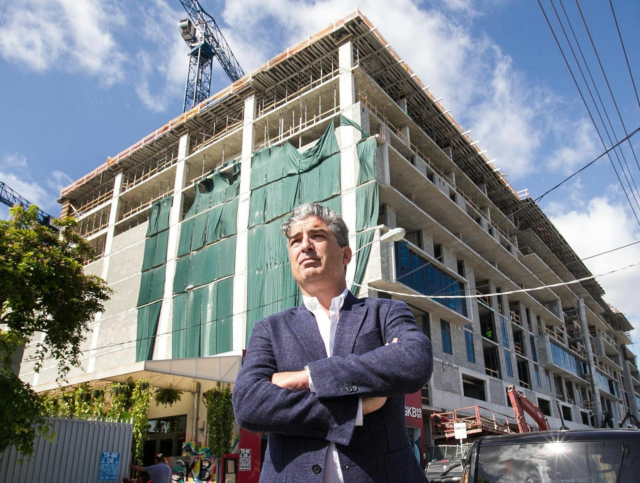 On April 12, 2018, after two years of construction, developer Carlos Rosso stands in front of Wynwood 25, a microunit building that is scheduled to top off later this summer and will be comprised entirely of microunit apartments. (C.M. Guerrero/Miami Herald/TNS)