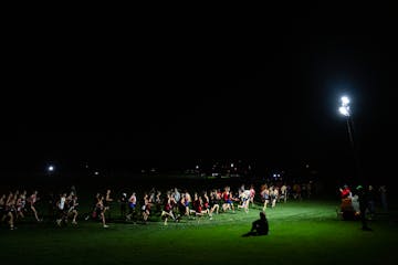 Runners compete in the boy's junior varsity race during the 58th Annual Metro Invitational Cross Country Meet Saturday, Sep. 16, 2023, at Flying Cloud