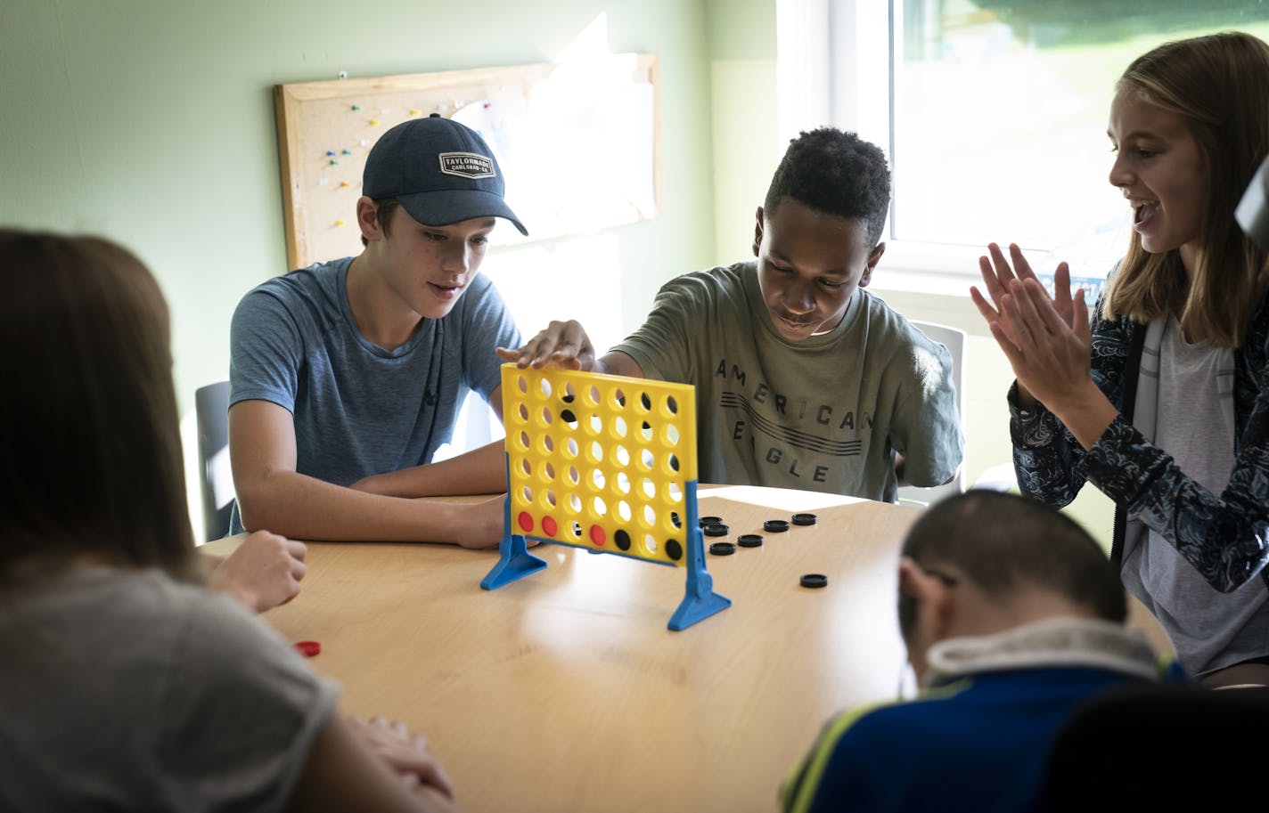 Luke Hoekstra, Korey Pruitt, and Josie Moe played Connect Four during a Peer Insights game day at South View Middle School in Edina, Minn., on Tuesday, September 24, 2019. ] RENEE JONES SCHNEIDER &#xa5; renee.jones@startribune.com At Edina's South View Middle School, a program called Peer Insights pairs special education students with their general education peers -- and is making a big difference across the school. The program, started a few years ago by a special education teacher, pairs the s