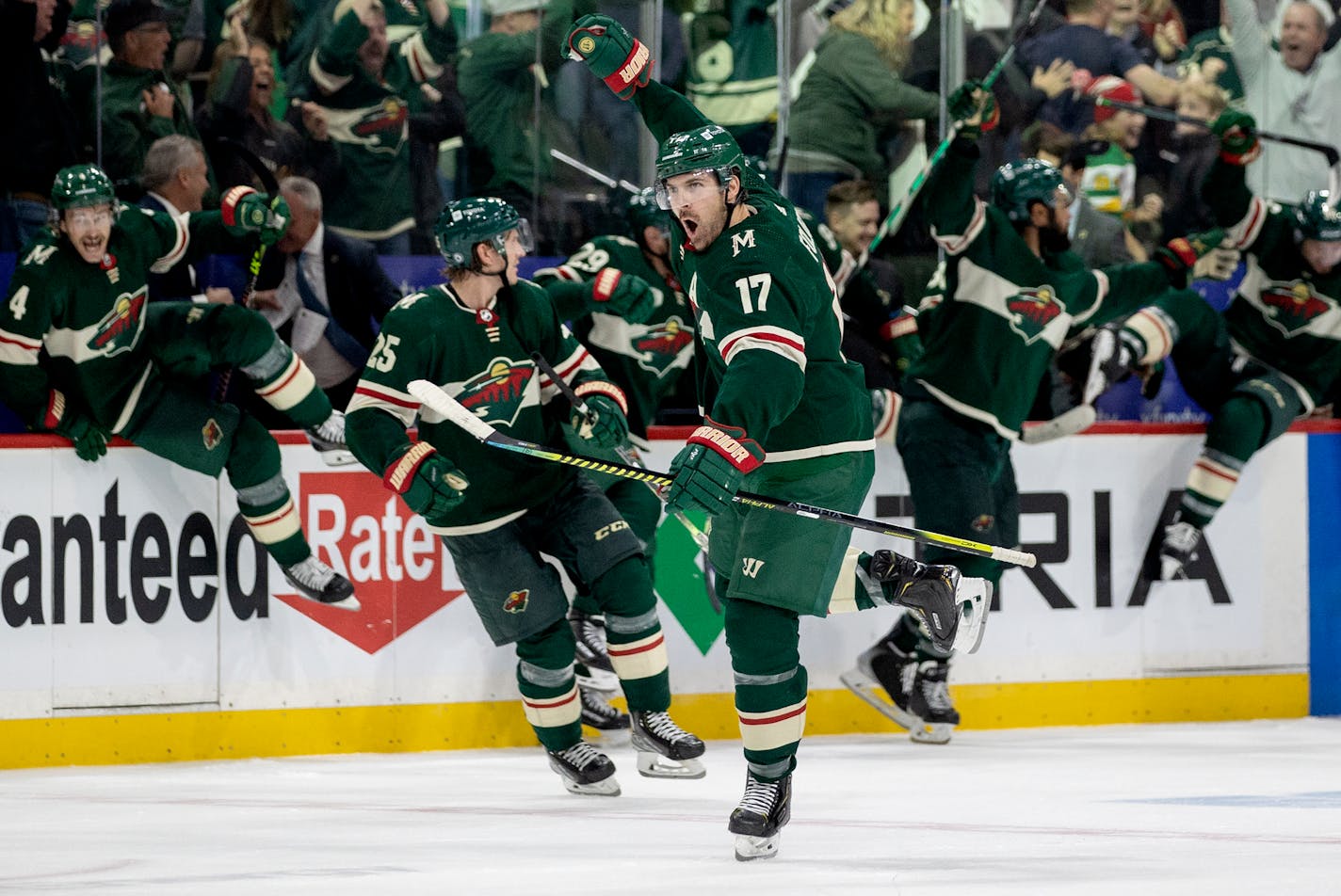 Marcus Foligno (17) of the Minnesota Wild celebrates at the end of the game Tuesday, Oct. 19 at Xcel Energy Center in St. Paul, Minn. Joel Eriksson Ek scored the game winner in overtime.