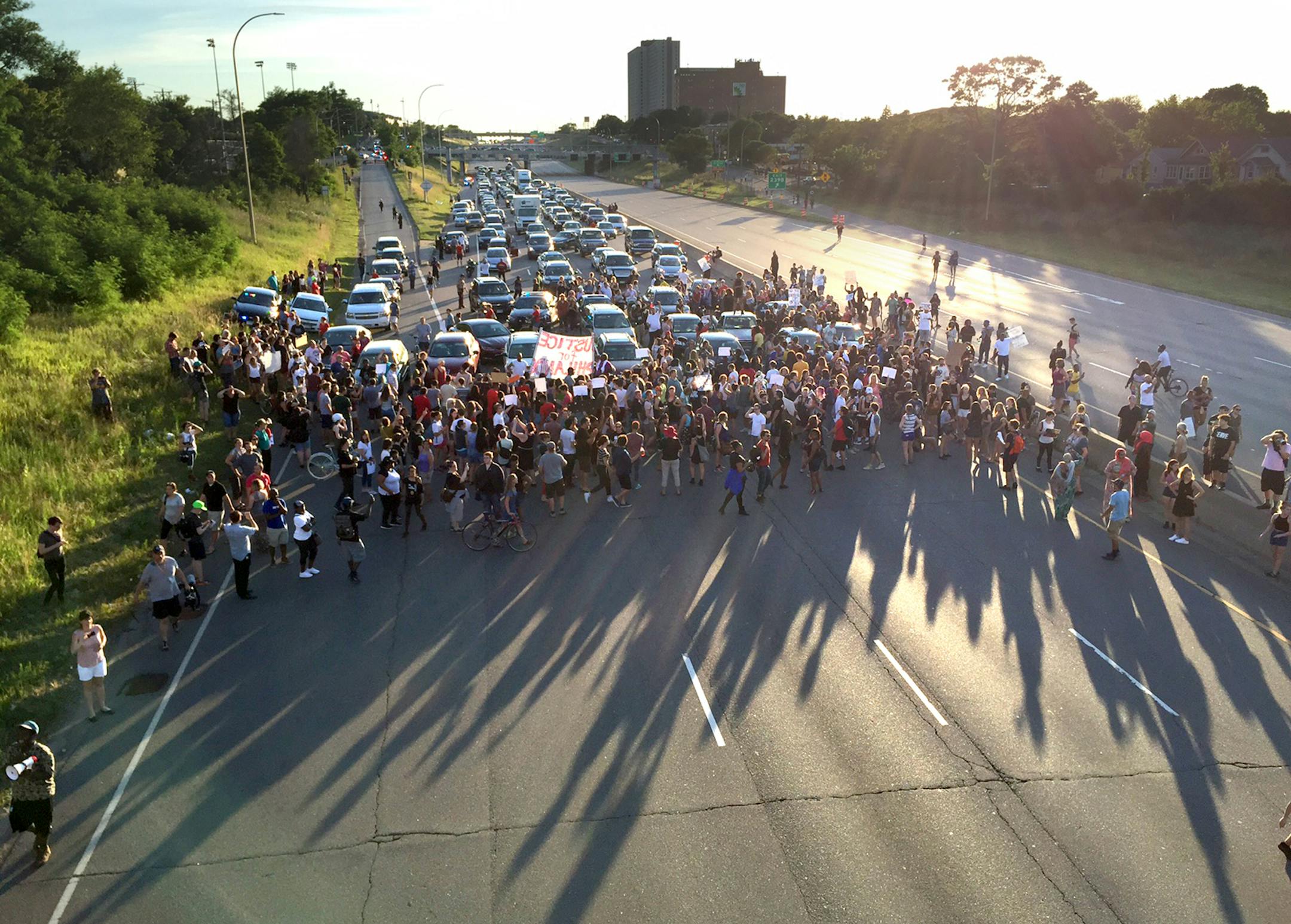 Marchers blocked part of Interstate 94 in St. Paul, Minn., on Saturday during a protest sparked by the recent police killings of black men in Minnesota and Louisiana. More than 20 members of law enforcement were injured during ensuing mayhem, primarily from demonstrators throwing objects.