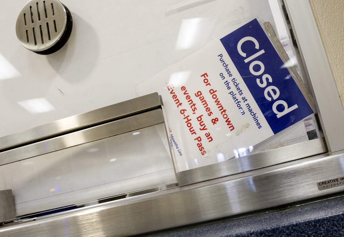 A closed sign sits in the corner of a ticket sales window at the Mall of America Metro Transit station in Bloomington November 27, 2015. Passengers can buy tickets from automated machines. (Courtney Perry/Special to the Star Tribune)