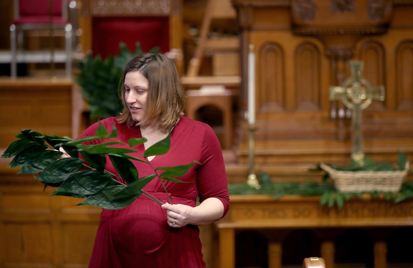 Anna Sanchez analyzed, organized and displayed the environmentally-friendly palms that were delivered at Central Presbyterian Church in St. Paul.