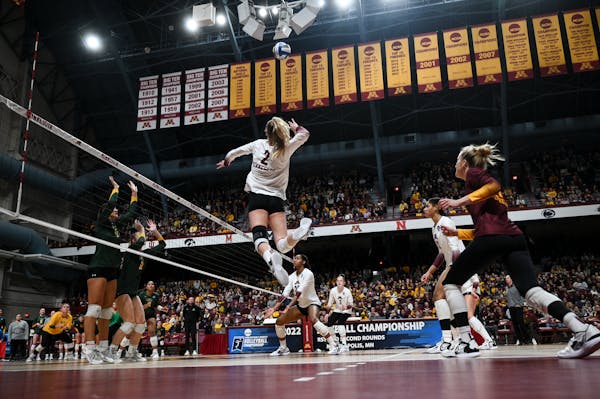 Minnesota Gophers outside hitter/opposite hitter Jenna Wenaas (2) leaps to hit the ball during the third set against Southeastern Louisiana in the fir