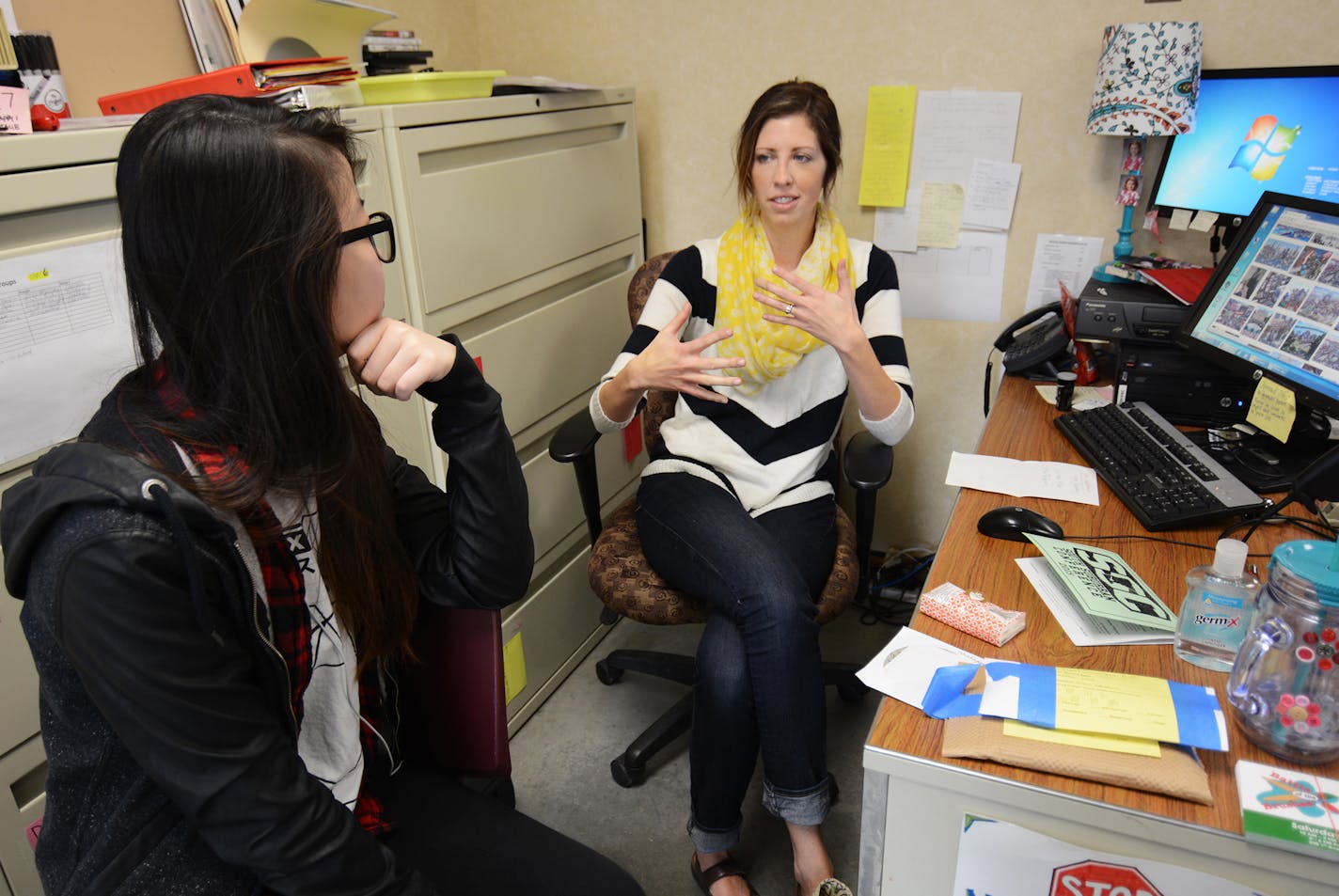 Chindaphone Soukhoummaley, 17, and her art instructor, Rachel Paulson, discussed possible mural designs at Shakopee High School. Photo by Liz Rolfsmeier, Special to the Star Tribune