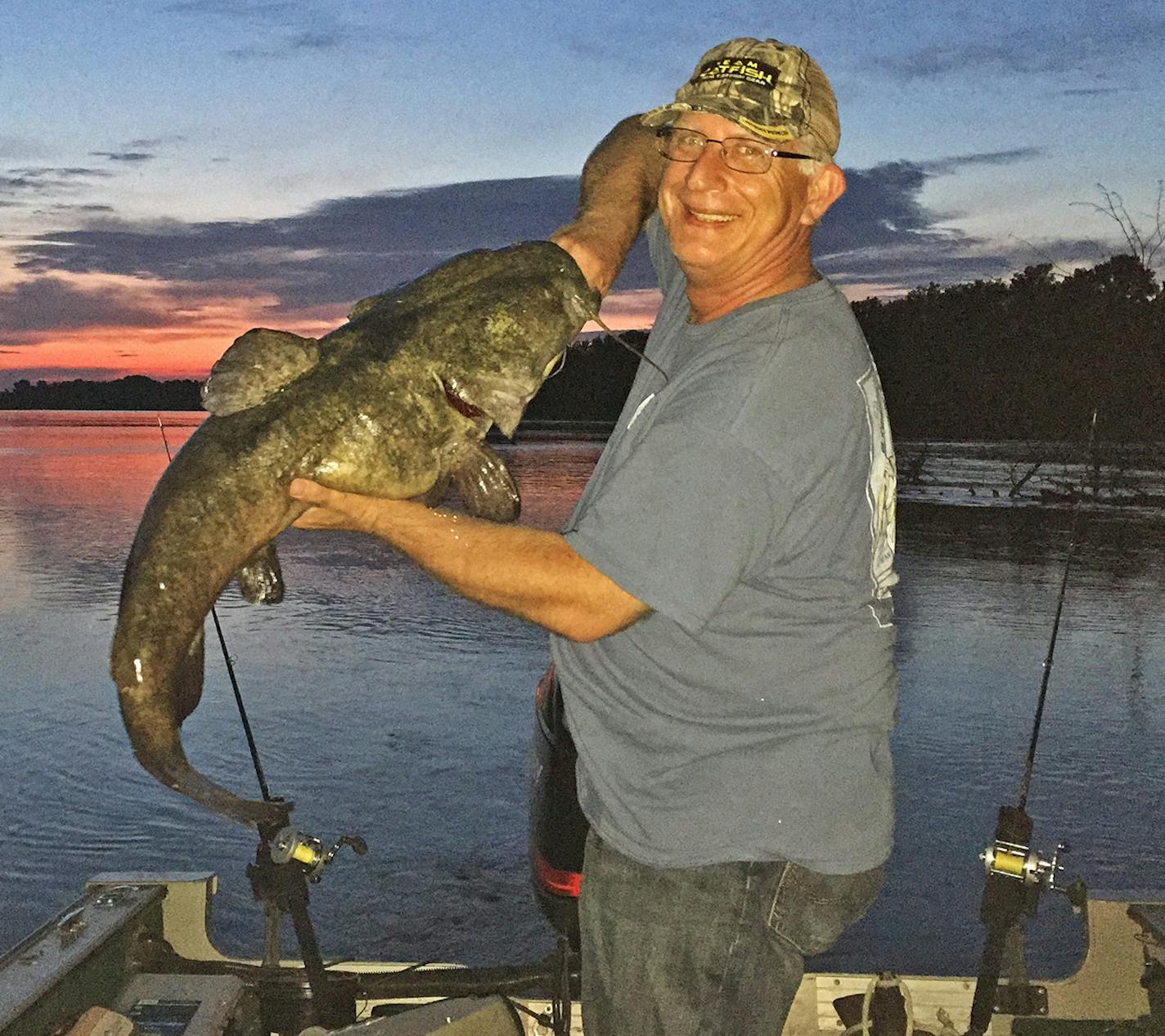 Brian Klawitter hoisted a dandy flathead catfish caught on the Mississippi. The fish weighed about 30 pounds.