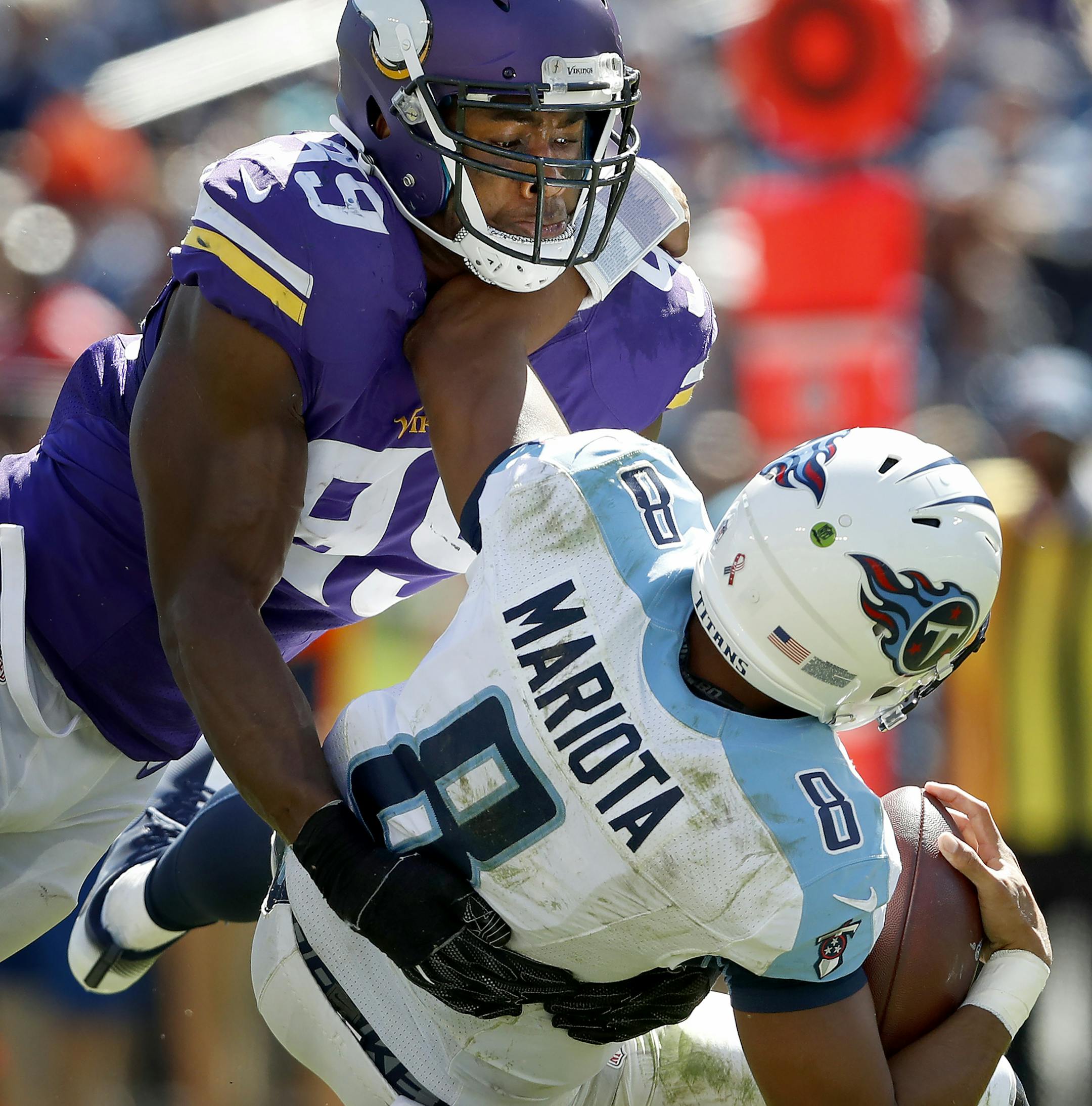 Danielle Hunter (99) sacked Marcus Mariota in the fourth quarter. ] CARLOS GONZALEZ cgonzalez@startribune.com - September 11, 2016, Nashville, TN, Nissan Stadium, NFL, Minnesota Vikings vs. Tennessee Titans