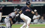 Cleveland Indians' Michael Brantley grounds out against Minnesota Twins starting pitcher Jake Odorizzi during the sixth inning of a baseball game, Wed