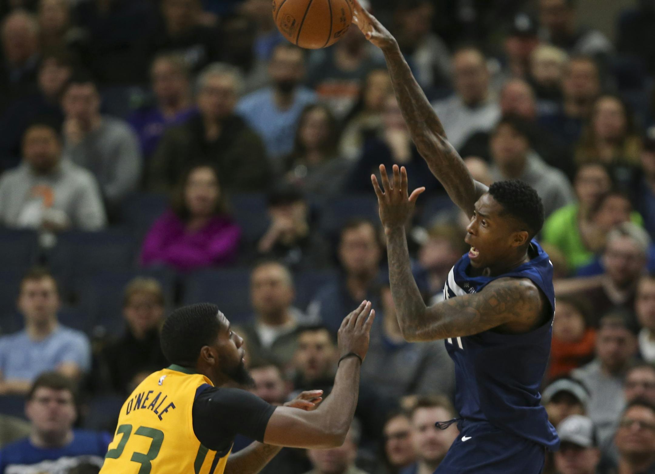 Minnesota Timberwolves guard Jamal Crawford (11) passed off after drawing the defense of Utah Jazz forward Royce O'Neale (23) in the first quarter. ] JEFF WHEELER ï jeff.wheeler@startribune.com The Minnesota Timberwolves faced the Utah Jazz in an NBA basketball game Sunday night, April 1, 2018 at Target Center in Minneapolis.