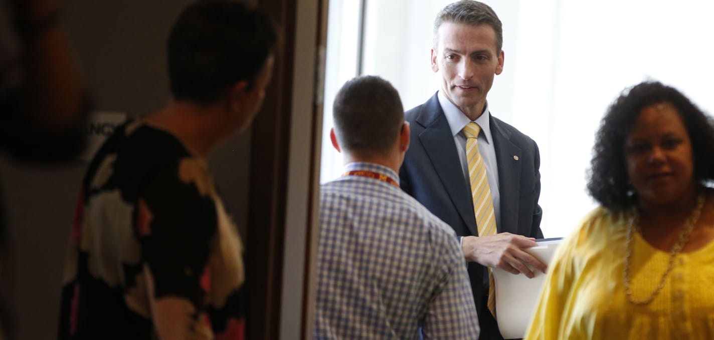 Ed Graff, shown at the Minneapolis school board meeting where members interviewed the candidates, would be the first permanent, white superintendent of the district in two decades.