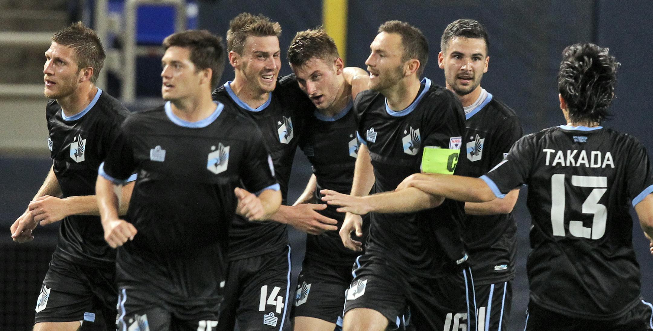 Minnesota United players celebrated after they scored a winning goal late in the game against Tampa Bay last season.