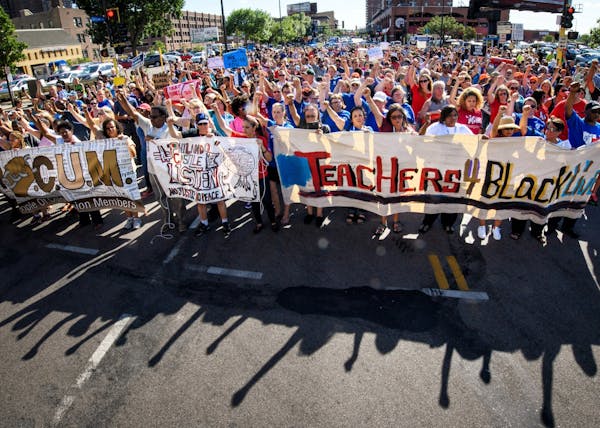 Marchers on Hennepin Ave. Protest for Philando Castile started at Minneapolis Convention Center, where the biennial convention of the American Federat