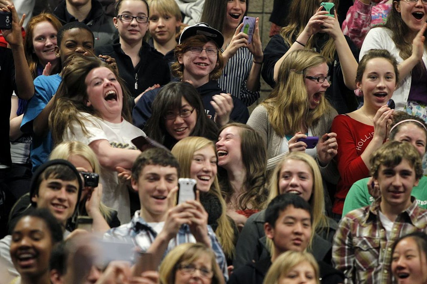 Minnesota high schoolers reacted as Grammy-nominated, multi-platinum trio the Jonas Brothers made a surprise visit to the gym at Minneapolis' Patrick Henry High School, filled with local students who are participating in We Day. The Canadian volunteer program is making its U.S. debut in the state.