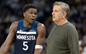 Wolves guard Anthony Edwards talks with coach Chris Finch during Game 3 against the Lakers in the first round April 25 at Target Center.