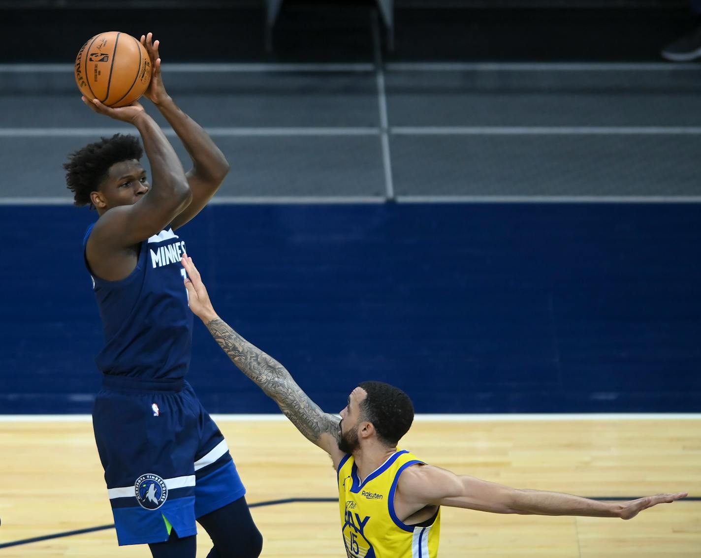 Minnesota Timberwolves forward Anthony Edwards (1) hit a 3-pointer against Golden State Warriors guard Mychal Mulder (15) in the second half.