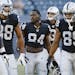 In this Aug. 22, 2019, file photo, Oakland Raiders' Antonio Brown (84) and teammates gather before an NFL preseason football game against the Green Ba