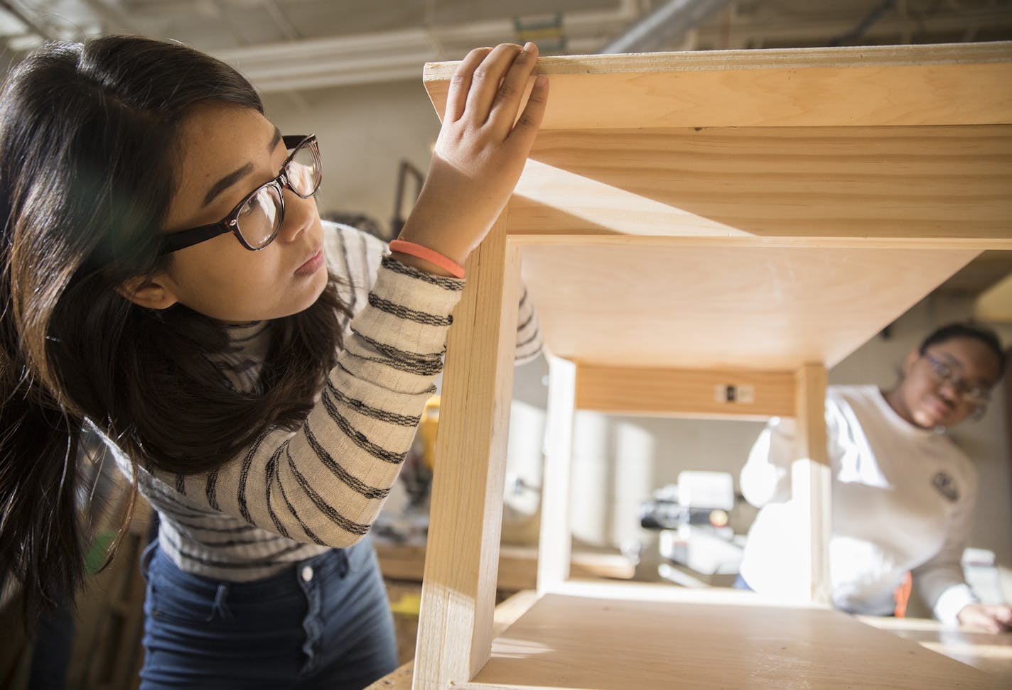 Tenzin Bhuti, 18, worked on a coffee table with her team during Andrew Kastenberg&#x2019;s women in engineering class at St. Anthony Village High School.