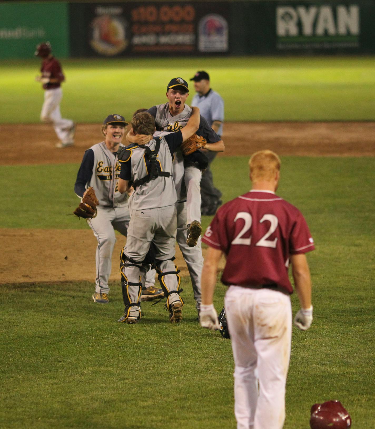 Totino-Grace's Matthew Stroh was met at the mound after Maple Grove's Mitchell Bauer, foreground, lined out to end the game.