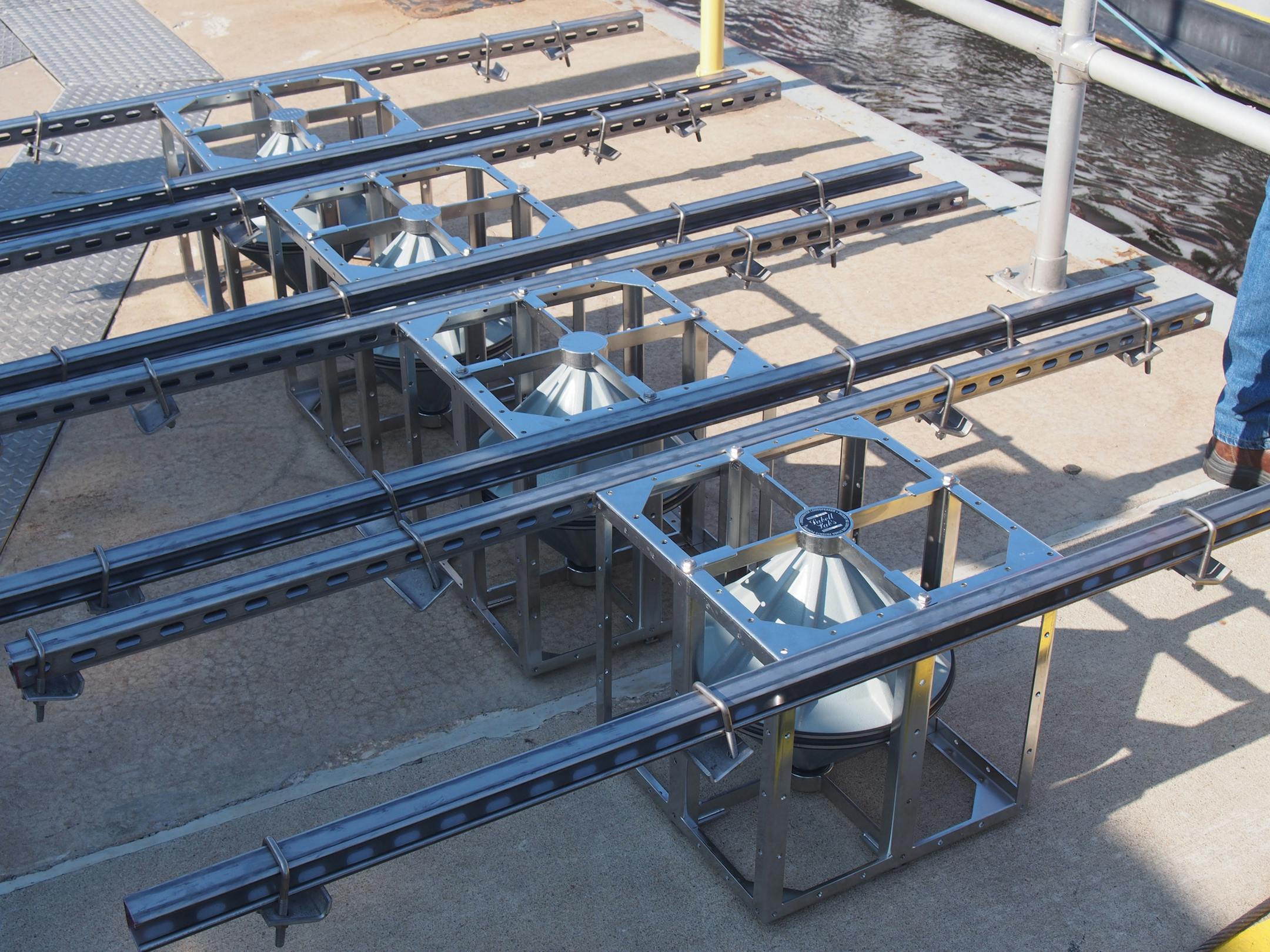 Five underwater speakers were attached recently at Lock 8 on the Mississippi River near Genoa, Wis. The experimental system is designed to repel Asian carp and prevent them from swimming up the river.