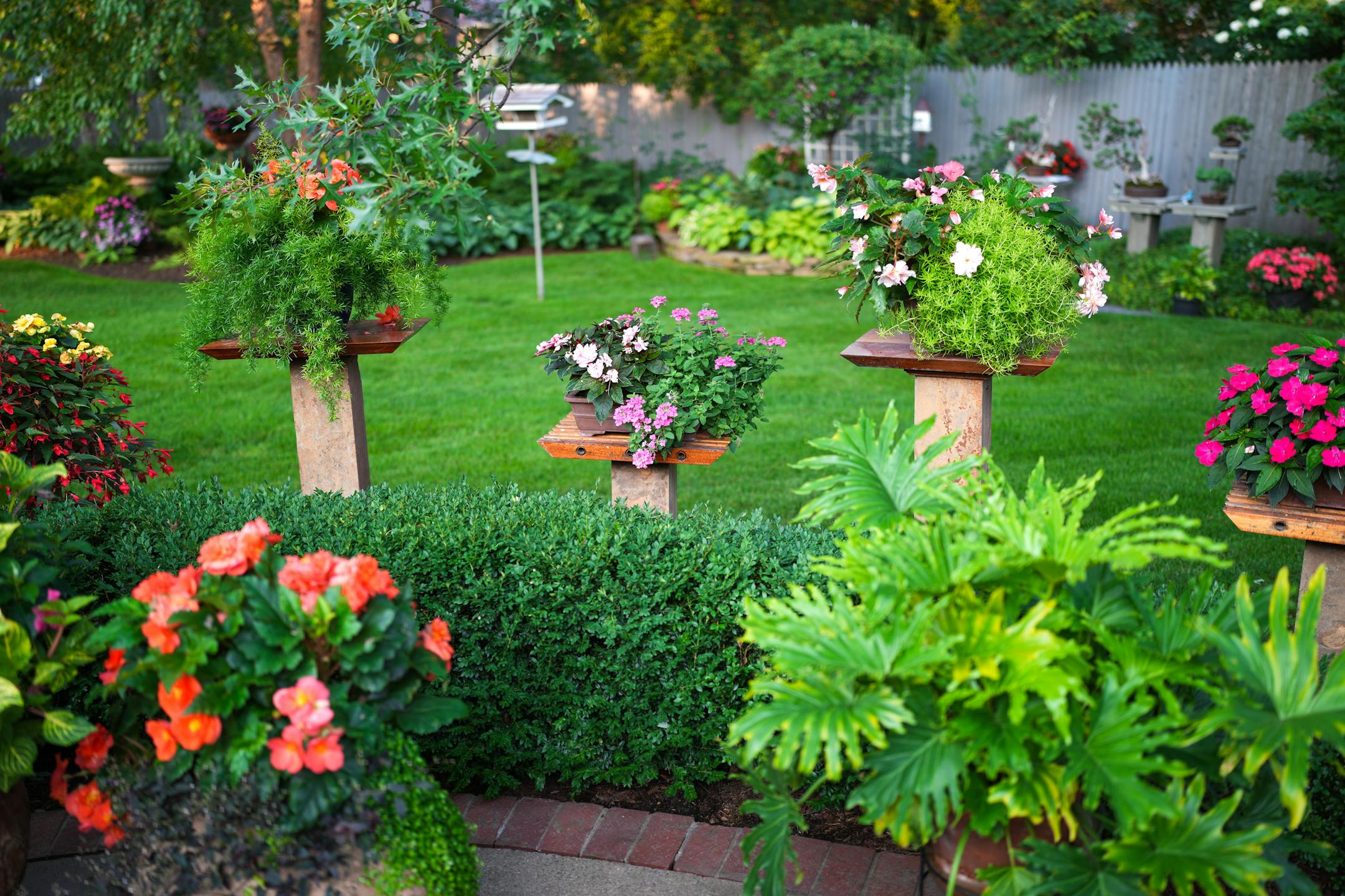 Curt made these stone based plant stands out of African Mahogany.