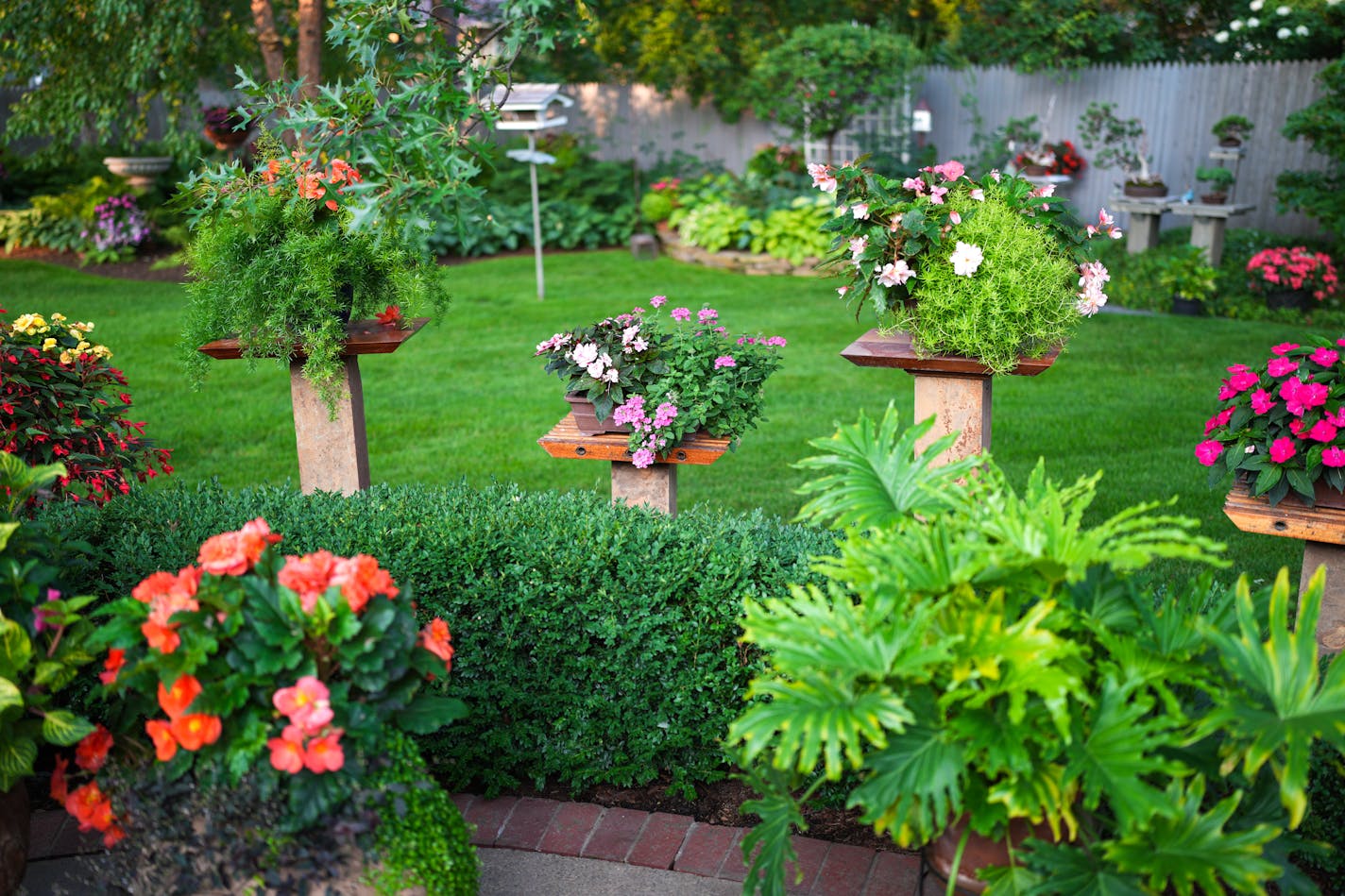 Curt made these stone based plant stands out of African Mahogany.