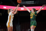 Gophers sophomore Mallory Heyer (24) shoots a three-pointer during a 22-point victory against North Dakota State at Williams Arena on Nov. 15.