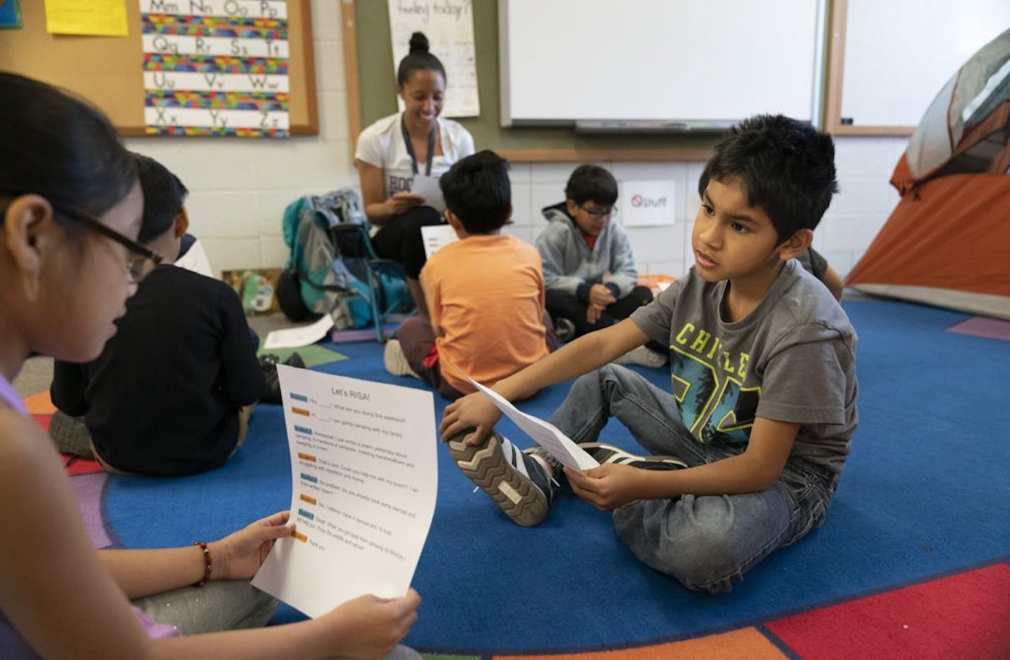 Miguel Leandro Stevens worked on a conversational exercise during an ESL class at Centennial Elementary School in Richfield, Minn., on Tuesday, May 7, 2019.