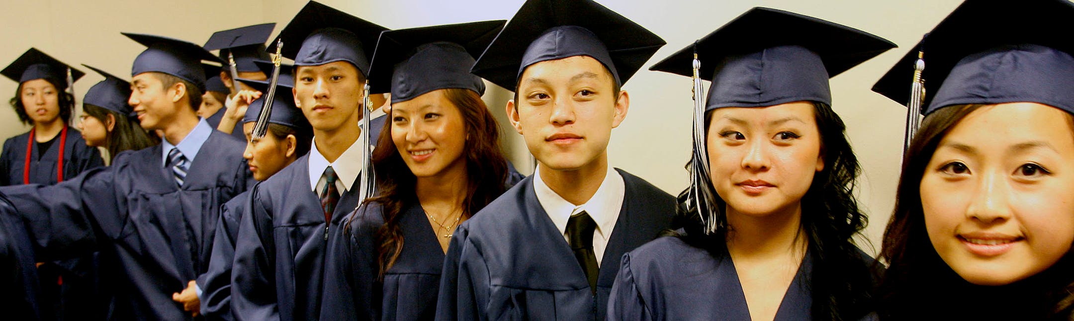 The Hmong Academy Charter School in St. Paul graduated its second class Thursday night with a graduation percentage rate in the 90s. Most in the senior class come from poor families where English is not the primary language.