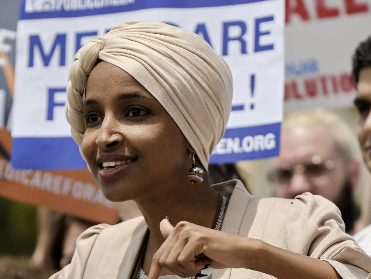 Rep. Ilhan Omar (D-Minn.), with Rep. Pramila Jayapal (D-Wash.), speaks during a news conference on the Medicare for All Act of 2019 outside the House of Representatives in Washington, June 12, 2019. (T.J. Kirkpatrick/The New York Times)