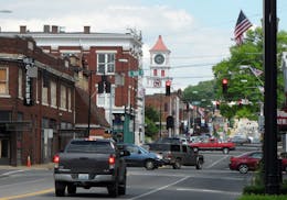 In this June 7, 2017 photo, vehicles drive through Hopkinsville, Ky. This town is considered the epicenter of the first total solar eclipse to sweep a