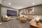 Lower-level tin accent wall, #229 by Mattamy Homes on the Parade of Homes tour.
