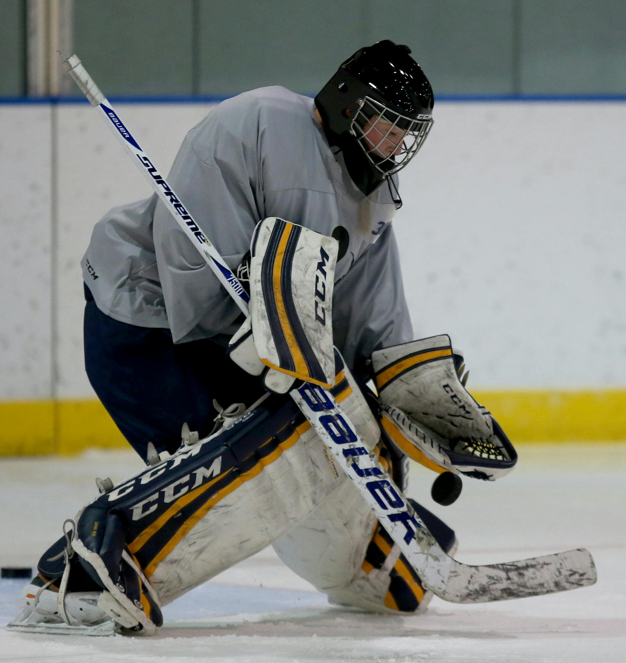 Breck goalie Sydney Scobee, blocked the shot of her teammate during practice. ] (KYNDELL HARKNESS/STAR TRIBUNE) kyndell.harkness@startribune.com During practice at Anderson Ice Arena in Golden Valley , Min., Thursday, November 20, 2014.