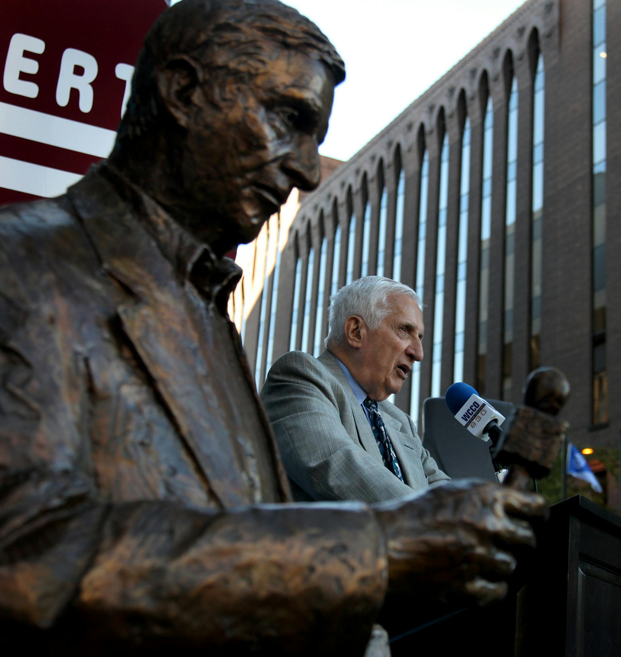 ELIZABETH FLORES &#x2022; eflores@startribune.com October 6, 2010 - Minneapolis, MN - The larger-than-life statue of Twin Cities media icon Sid Hartman, was commissioned to celebrate his 90th birthday (Sid turned 90 on March 15, 2010) as well as 63 years at the Star Tribune and 55 years on WCCO Radio. Minneapolis sculptor Nick Legeros captures Sid with his classic WCCO Radio microphone, over-sized tape recorder and Star Tribune newspaper tucked under his arm. IN THIS PHOTO:] Star Tribune columni