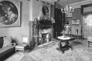 One of two ornate front parlors at St. Agatha's, this room is now the registration area for hotel guests.