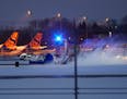 A plow cleared snow last year at MSP airport.