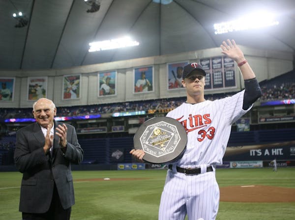 Twins first baseman Justin Morneau waved to the Metrodome crowd after receiving his American League MVP award.