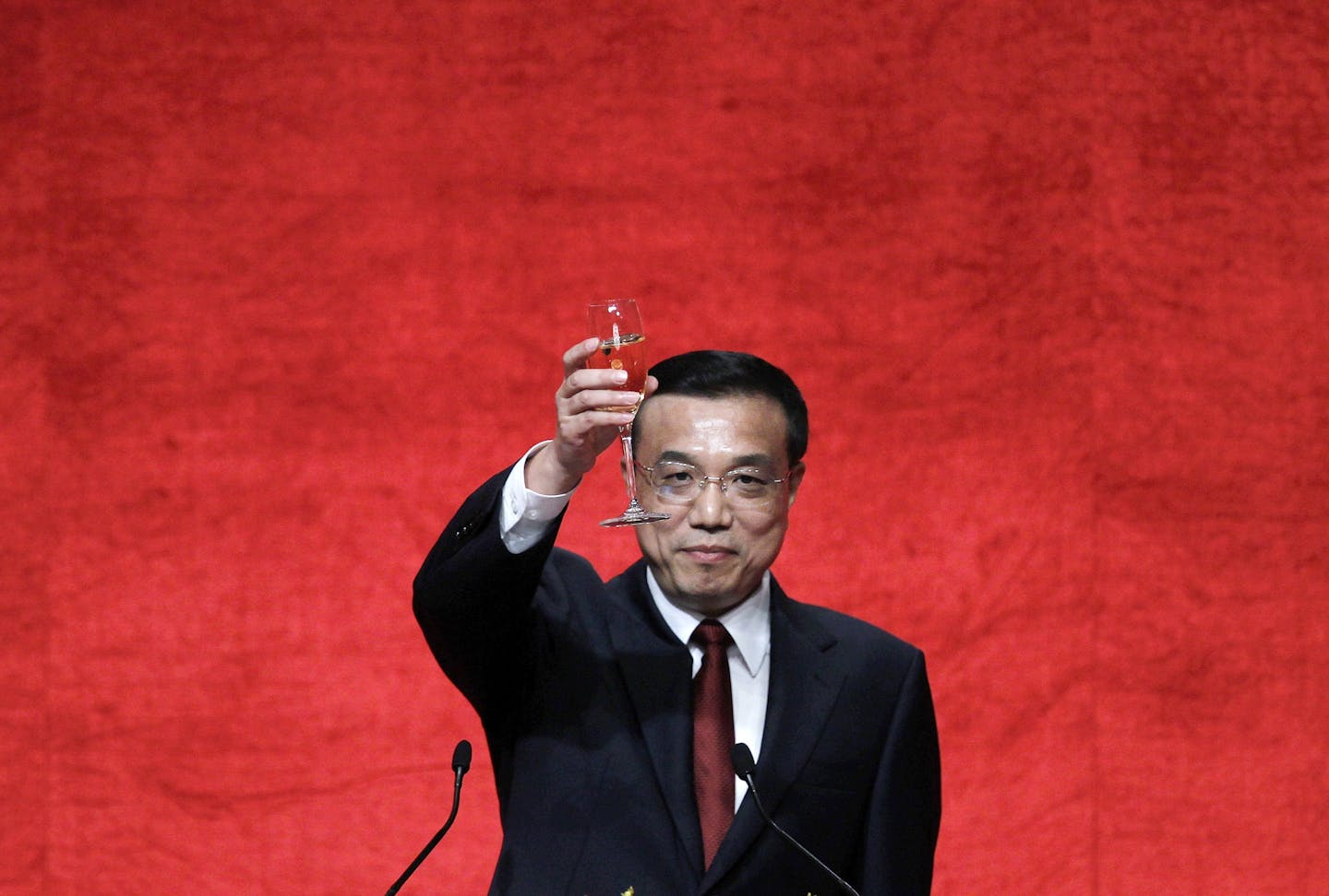 China's Vice Premier Li Keqiang makes a toast during a welcoming dinner at a hotel in Hong Kong Wednesday, Aug. 17, 2011. Li, who is widely expected to become China's next premier, announced a draft of measures to boost the service sector and financial industry, both pillars of Hong Kong's economy.