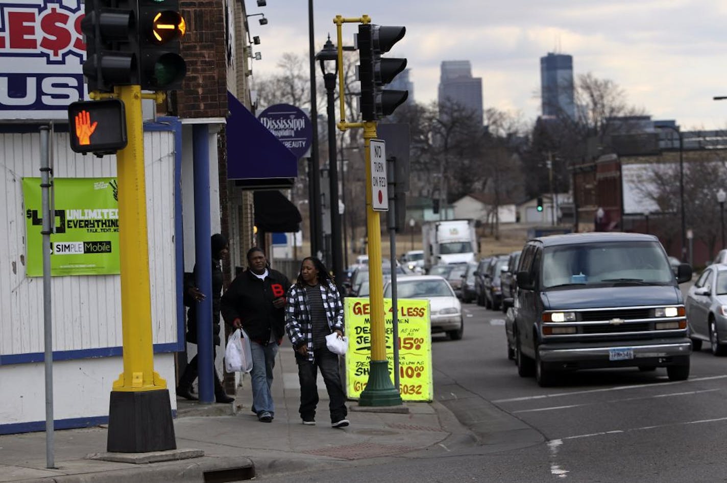 The Minneapolis city skyline is visible at the intersection of West Broadway Ave. and North Penn Ave. Friday, Feb. 17, 2012, in North Minneapolis, MN.