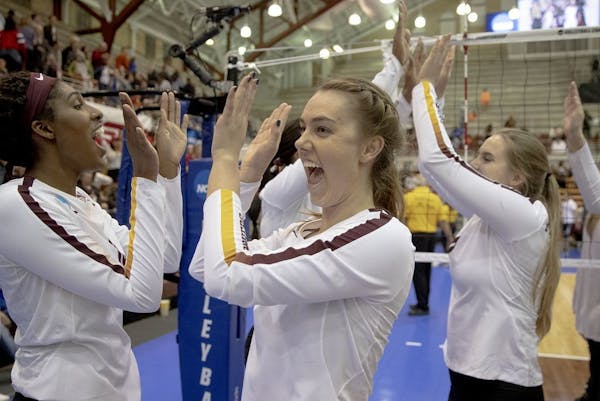 Minnesota setter Kylie Miller (14) celebrated sweeping Louisville in the fourth round of the NCAA volleyball tournament on Saturday, Dec. 14, 2019, in
