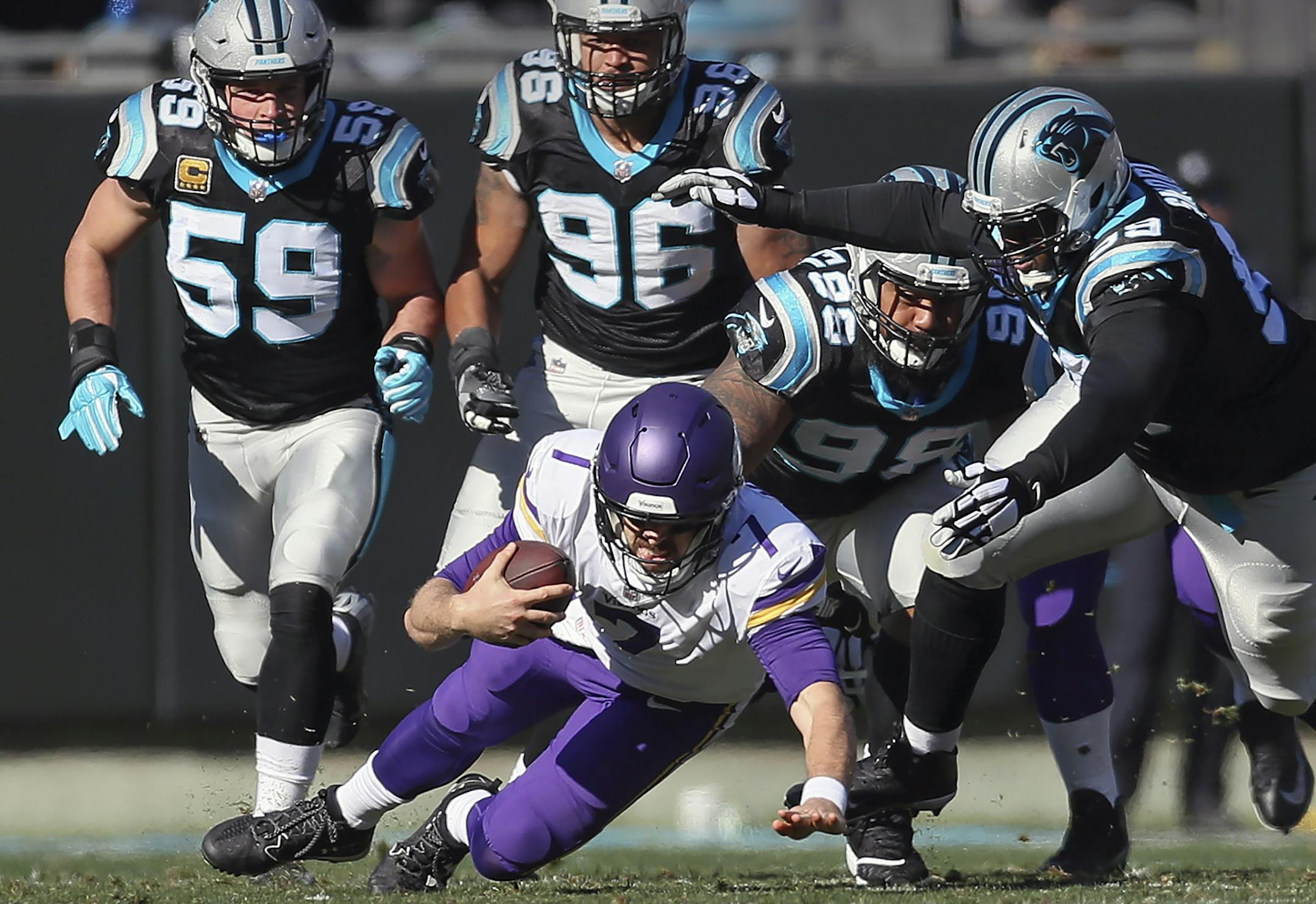 Vikings quarterback Case Keenum was chased down by Carolina defenders early in last week's game..