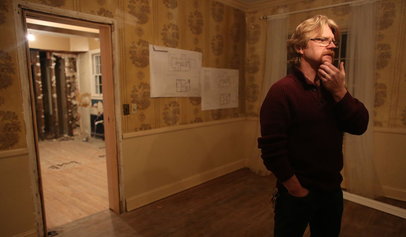 Tim Koch paused as he talked about the rewards and challenges as they remodel the 155-year old Woodbury House into the Mad Hatter Tea Room in Anoka, Min., Tuesday, November 26, 2013. ] (KYNDELL HARKNESS/STAR TRIBUNE) kyndell.harkness@startribune.com