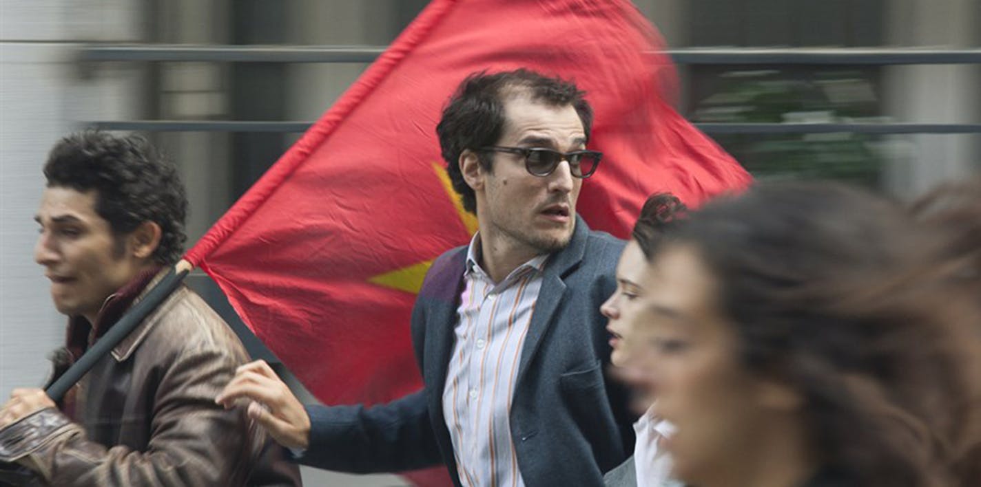 Louis Garrel as Jean-Luc Godard in Michel Hazanavicius' "Godard Mon Amour," which centers around the French political protests of 1968. (Maya Anand/Cohen Media Group) ORG XMIT: 1229337