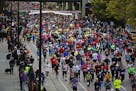 The start of the 2014 Twin Cities Marathon. Four days before more than 11,000 runners line up for the start of Sunday's marathon, the threat by protes