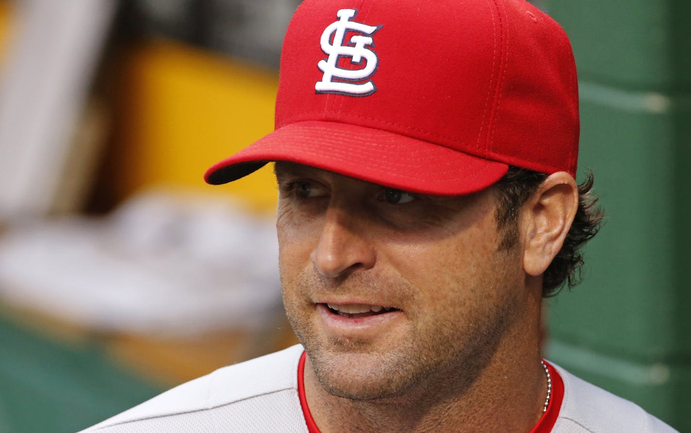 St. Louis Cardinals manager Mike Matheny stands in the dugout before a baseball game against the Pittsburgh Pirates in Pittsburgh Saturday, May 10, 2014. The Pirates won 4-3. (AP Photo/Gene J. Puskar) ORG XMIT: PAGP