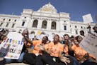 Students from around the Twin Cities Metro area rallied at the State Capitol to protest against gun violence in St. Paul on Friday, April 20, 2018. LE