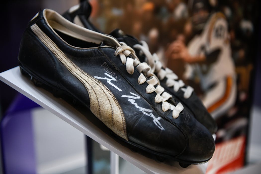 Football shoes signed by Fran Tarkenton at the new Vikings Museum.